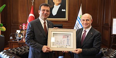 AKGÜN’Ü MAKAMINDA TEBRİK ETTİ 